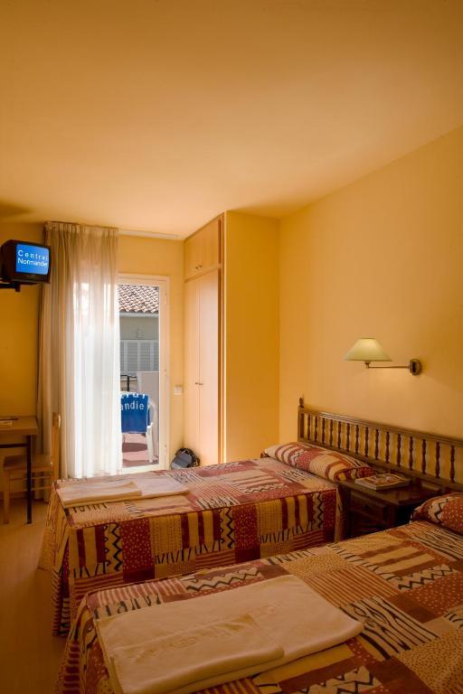 Hotel Central Normandie Sitges Quarto foto